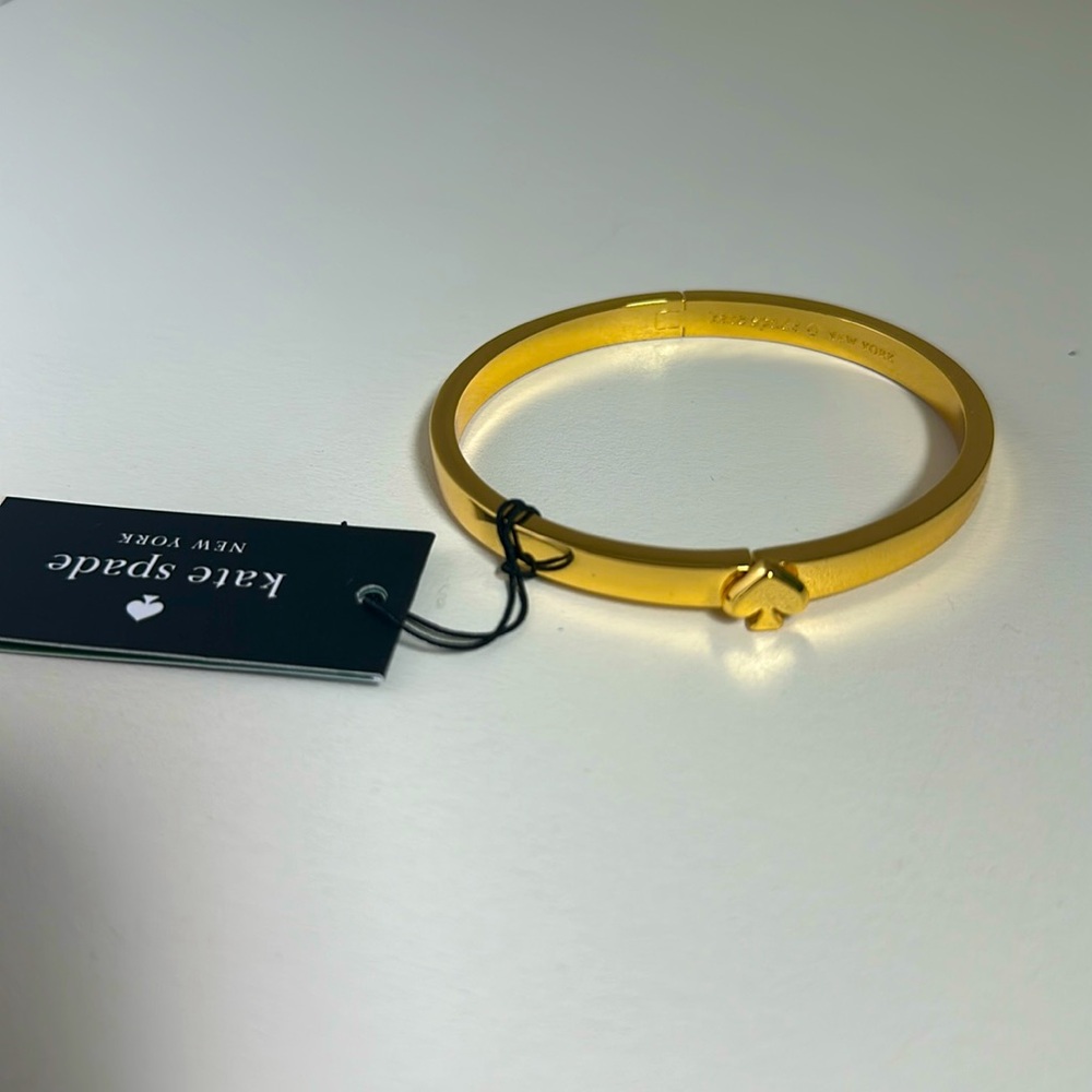Brand new with tag Kate Spade gold bracelet -never worn